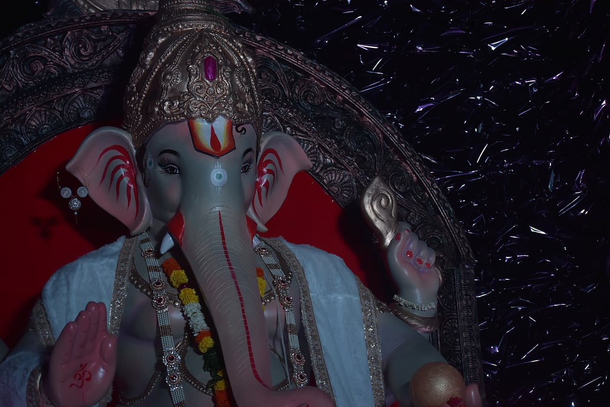 <div class="paragraphs"><p>Lord Ganesha gleams in this dark themed exhibit as if he is the moonlight incarnate. Again radiating peace and a feeling of shelter for those who are lost. (Photo by: Divya Prata/NDTV Profit)</p></div>