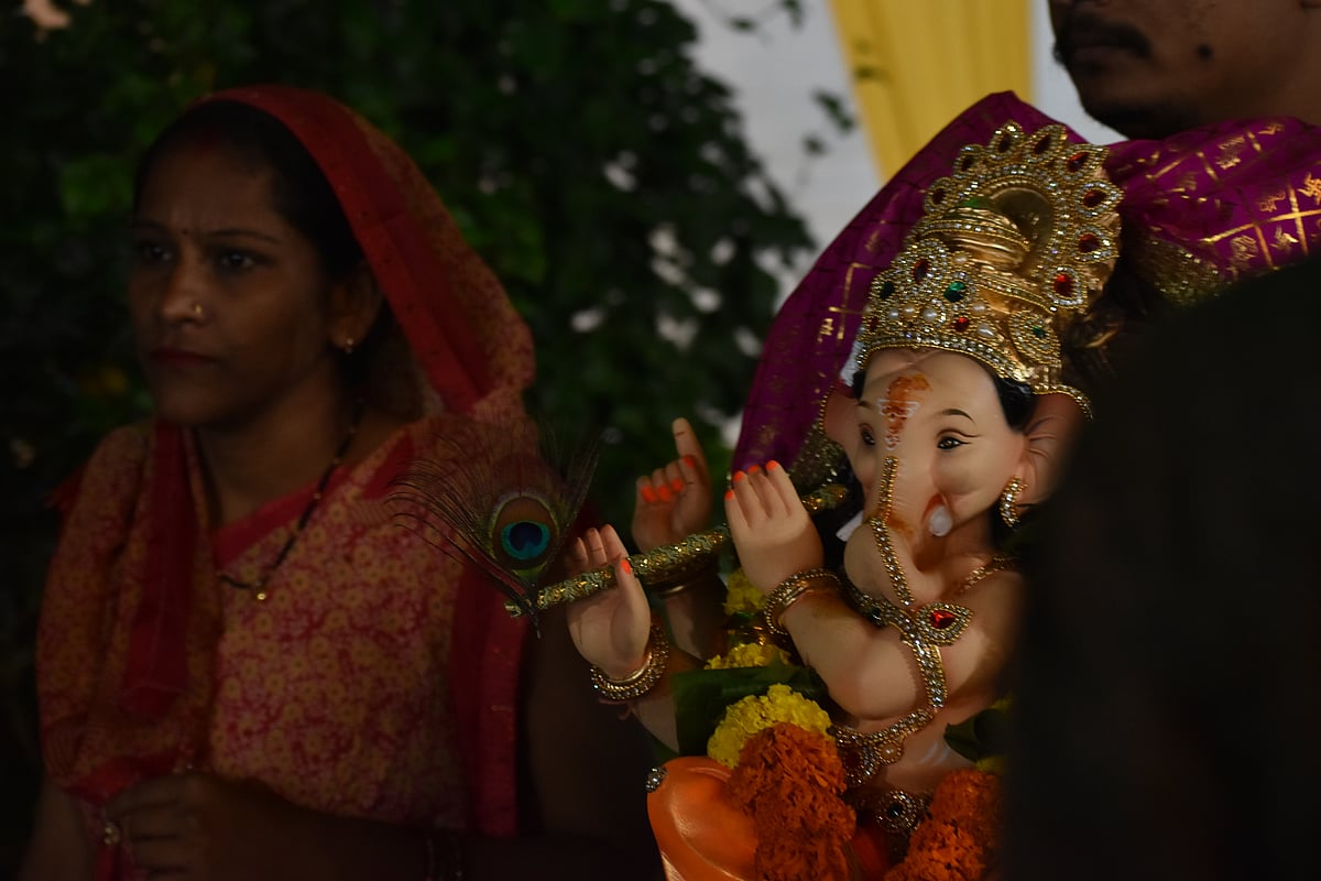 <div class="paragraphs"><p>A God of many feats, here is little Gannu adorning  Krishna's flute. (Photo by Khushi Maheshwari/NDTV Profit)</p></div>
