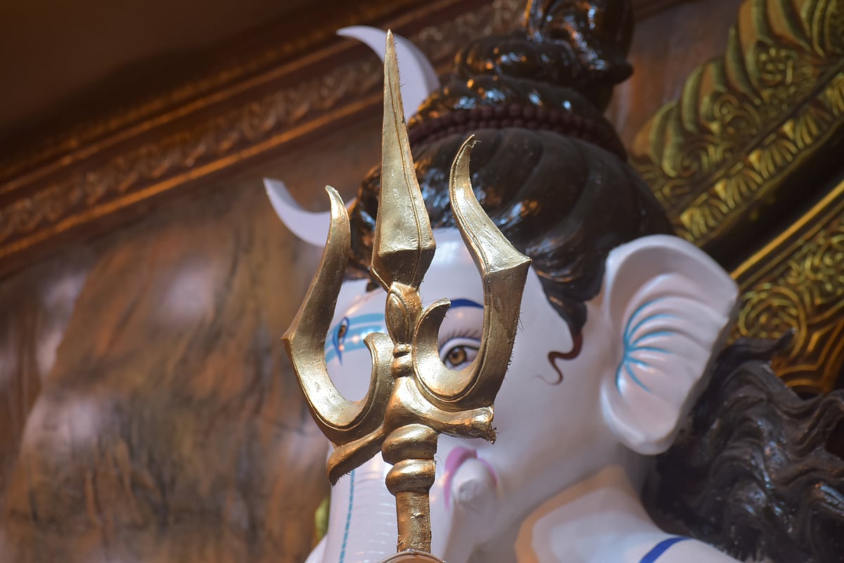 <div class="paragraphs"><p>Ganesha Glimpses at his disciples through his father's cardinal weapon, the Trishool or trident. (Photo by Divya Prata/ NDTV Profit)&nbsp;</p></div>