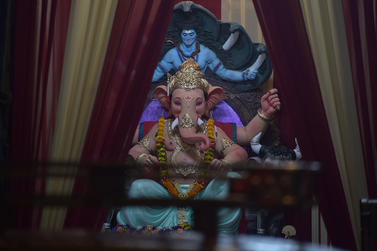 <div class="paragraphs"><p>Lord Shiva watches over young Gannu. </p><p>(Photo by: Divya Prata/ NDTV Profit)</p></div>