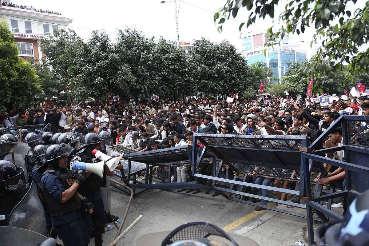 <div class="paragraphs"><p>The protests turned violent when agitators broke through police barricades near the Parliament building (Image: NDTV)</p></div>