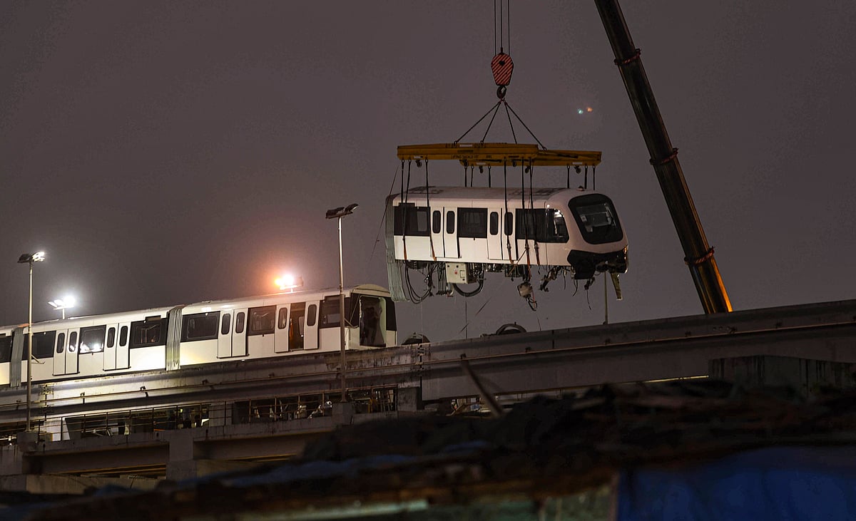 <div class="paragraphs"><p>A portion of a monorail train, which got damaged after it tilted during a test run,is being towed away at Wadala depot in Mumbai on Wednesday, Nov. 5, 2025. (Photo: Shashank Parade/PTI)</p></div>