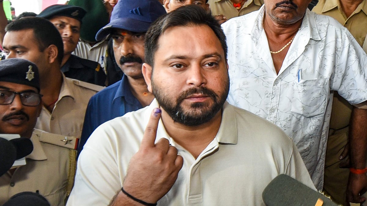 <div class="paragraphs"><p>RJD leader and Leader of Opposition in Bihar Assembly Tejashwi Yadav shows his finger marked with indelible ink as he addresses the media after casting vote at a polling station during the first phase of Bihar Assembly elections, in Patna on Thursday, Nov. 6, 2025. (Photo: PTI)</p></div>