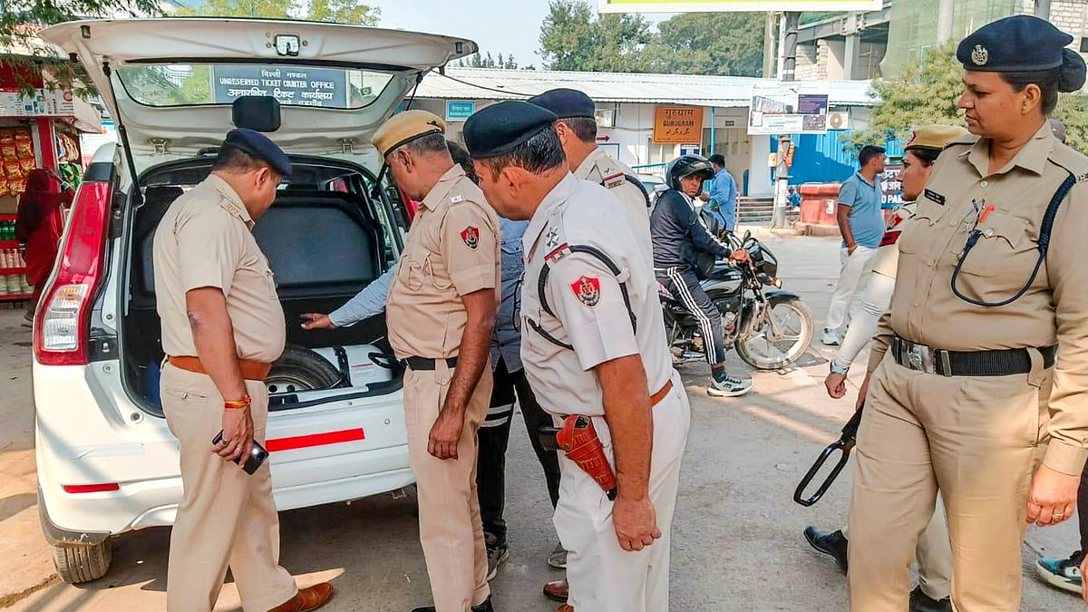 <div class="paragraphs"><p>Security personnel check a vehicle at a railway station, after security was beefed up following a blast near the Red Fort, in Gurugram. (Photo: PTI)</p></div>