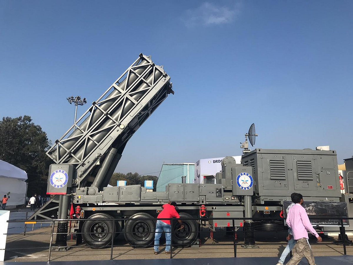 <div class="paragraphs"><p>Bharat Forge’s defence order book swells to Rs 94,700 crore; new wins boost visibility. </p><p>(Photo source NDTV Profit/ Bharat Forge Defence and Aerospace and Aero India Show Medium range surface to air missile launcher DRDO 200219)</p></div>