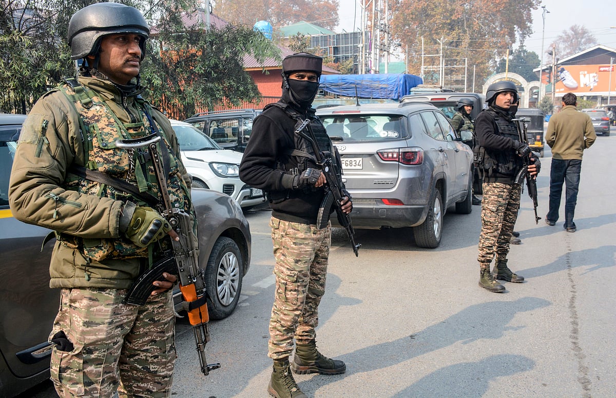 <div class="paragraphs"><p>Srinagar: Quick Response Team (QRT) personnel stand guard the streets and maintain heightened vigil following a security red alert issued after fresh inputs of attack warnings, in Srinagar, Monday, Nov. 17, 2025. (PTI Photo)</p></div>