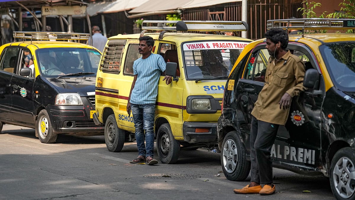 <div class="paragraphs"><p>Taxi drivers stand beside their vehicles parked in a queue amid supply disruptions after damage to a major gas pipeline, in Mumbai on Tuesday, Nov. 18, 2025. (Photo:&nbsp;Kunal Patil/PTI)</p></div>