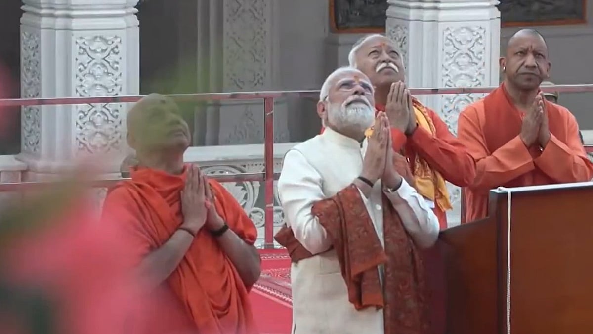 <div class="paragraphs"><p>Uttar Pradesh Chief Minister Yogi Adityanath presented miniature models of the Saffron Flag ceremonially hoisted on the 'shikhar' of Shri Ram Janmbhoomi Mandir and Ram Lalla idol at the temple, to PM Narendra Modi and RSS Sarsanghchalak Mohan Bhagwat. (Photo: PTI video screengrab)</p></div>