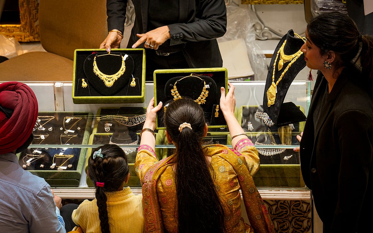 <div class="paragraphs"><p>New Delhi: Customers at a jewellery shop in New Delhi. (PTI Photo/Karma Bhutia)</p></div>