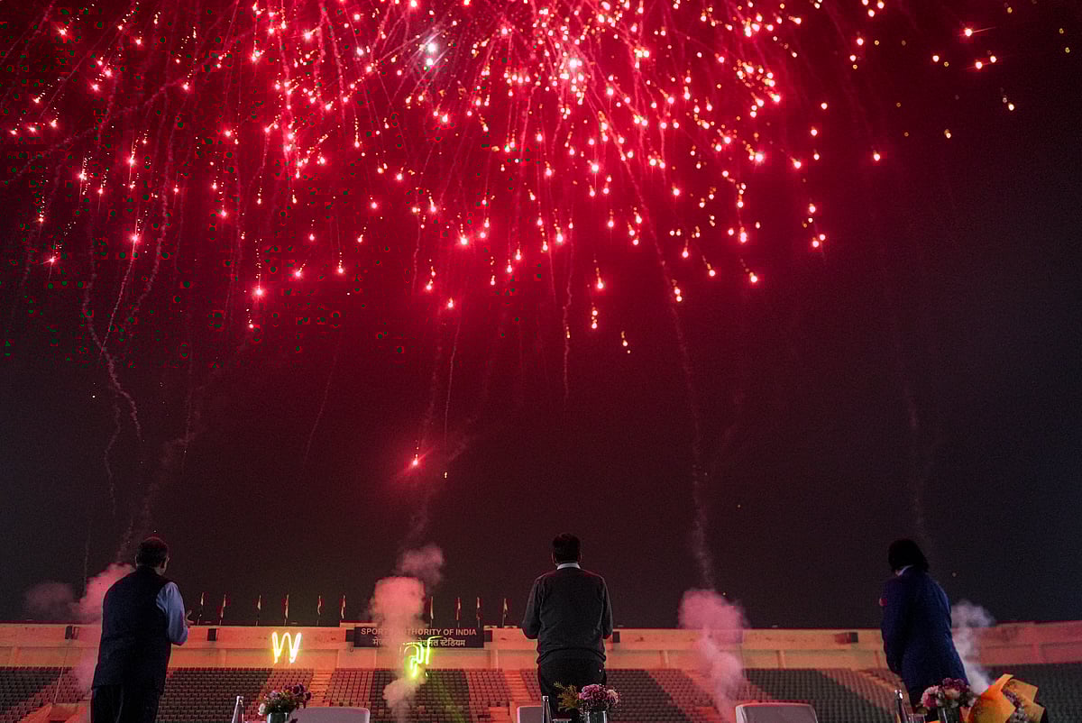 <div class="paragraphs"><p>Union Sports and Youth Affairs Minister Mansukh Mandaviya (centre), Ministry's Department of Sports Secretary Hari Ranjan Rao (left) and Indian Olympic Association (IOA) EC Member Rohit Rajpal look at the fireworks during an event after Ahmedabad was formally awarded hosting rights of 2030 Commonwealth Games, in New Delhi, Wednesday, Nov. 26, 2025. (Photo: PTI)</p></div>