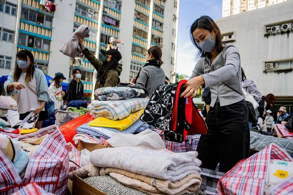 Hong Kong Blaze Death Toll Climbs to 128, Arrests Widen