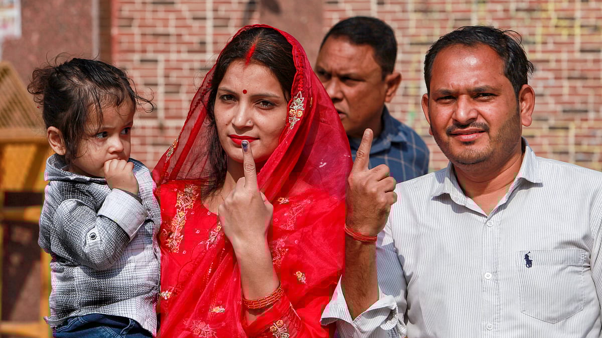 <div class="paragraphs"><p>Voters pose for a photograph at a polling booth during the Municipal Corporation of Delhi (MCD) bye-elections, in New Delhi on Sunday, Nov. 30, 2025. (Photo: PTI)</p></div>