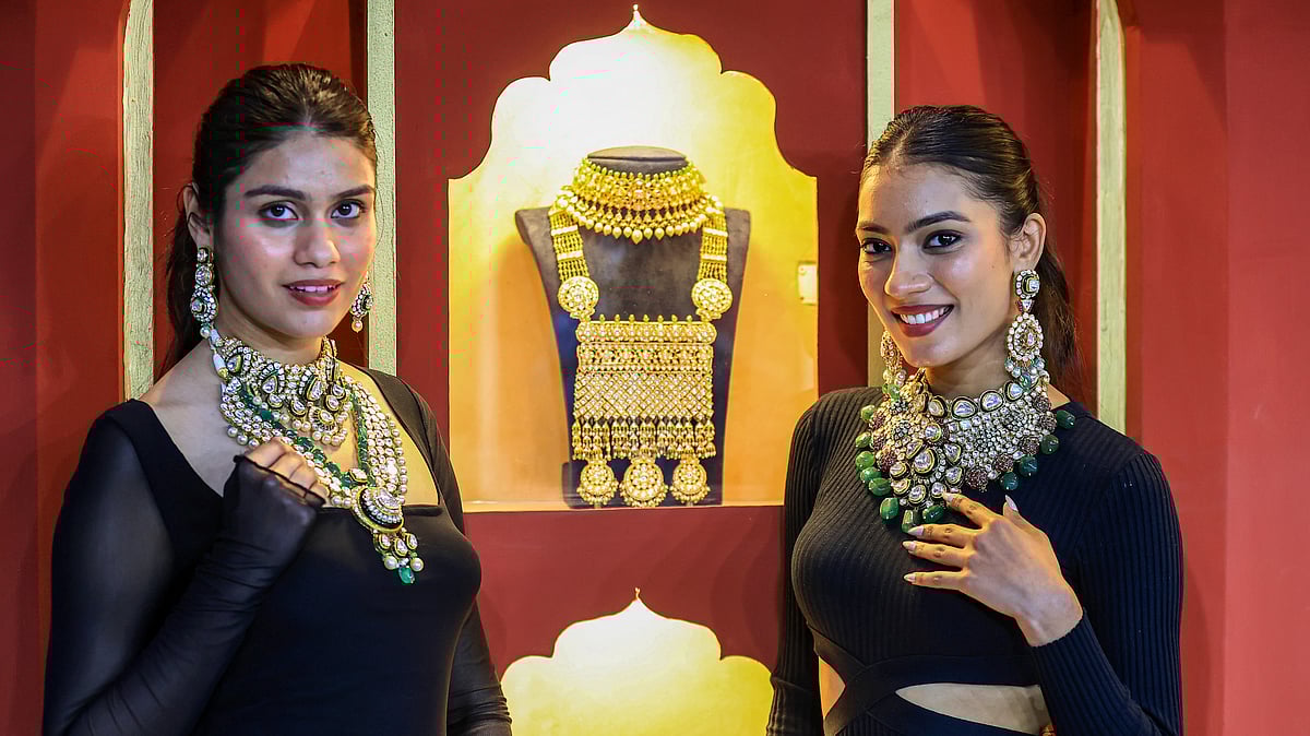 <div class="paragraphs"><p>Models pose outside a jewellery stall during the 'Jaipur Jewellery Show 2025' at the Novotel Jaipur Convention Centre, in Jaipur. (Photo: PTI)</p></div>