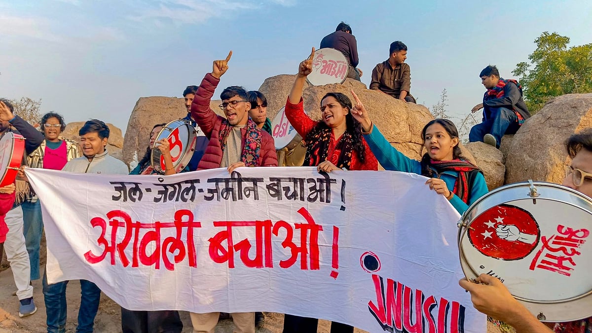 <div class="paragraphs"><p>Students display banners during a protest for the protection of the Aravalli Hills at Jawaharlal Nehru University, in New Delhi, Saturday, Dec. 27, 2025. (PTI Photo)</p></div>