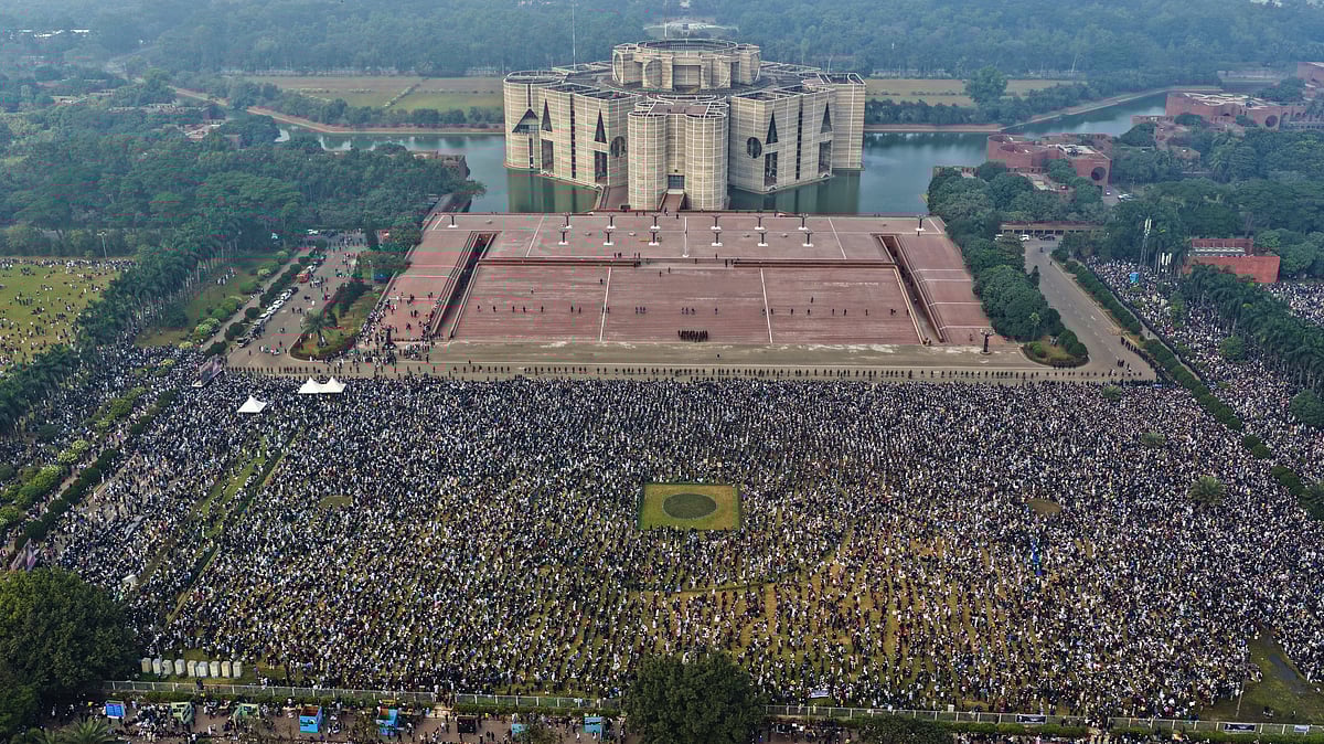 <div class="paragraphs"><p>Thousands of people gather to attend funeral prayers for former Prime Minister Khaleda Zia outside the national Parliament building in Dhaka, Bangladesh, Wednesday, Dec. 31, 2025. (Photo: AP/PTI)</p></div>