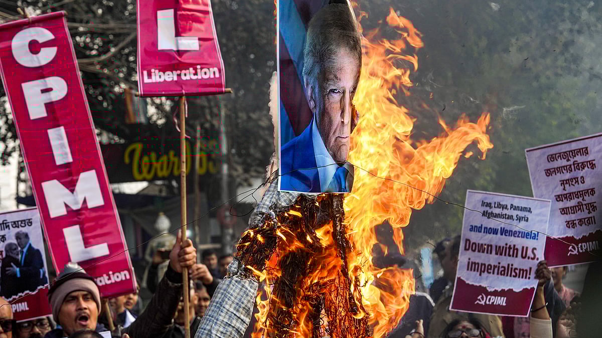 <div class="paragraphs"><p>Kolkata: Supporters of CPI (ML) Liberation take part in a protest march to condemn the capture of Venezuelan President Nicolas Maduro and his wife Cilia Flores by the United States, in Kolkata, Monday, Jan. 5, 2026. (PTI Photo/Manvender Vashist Lav)</p></div>