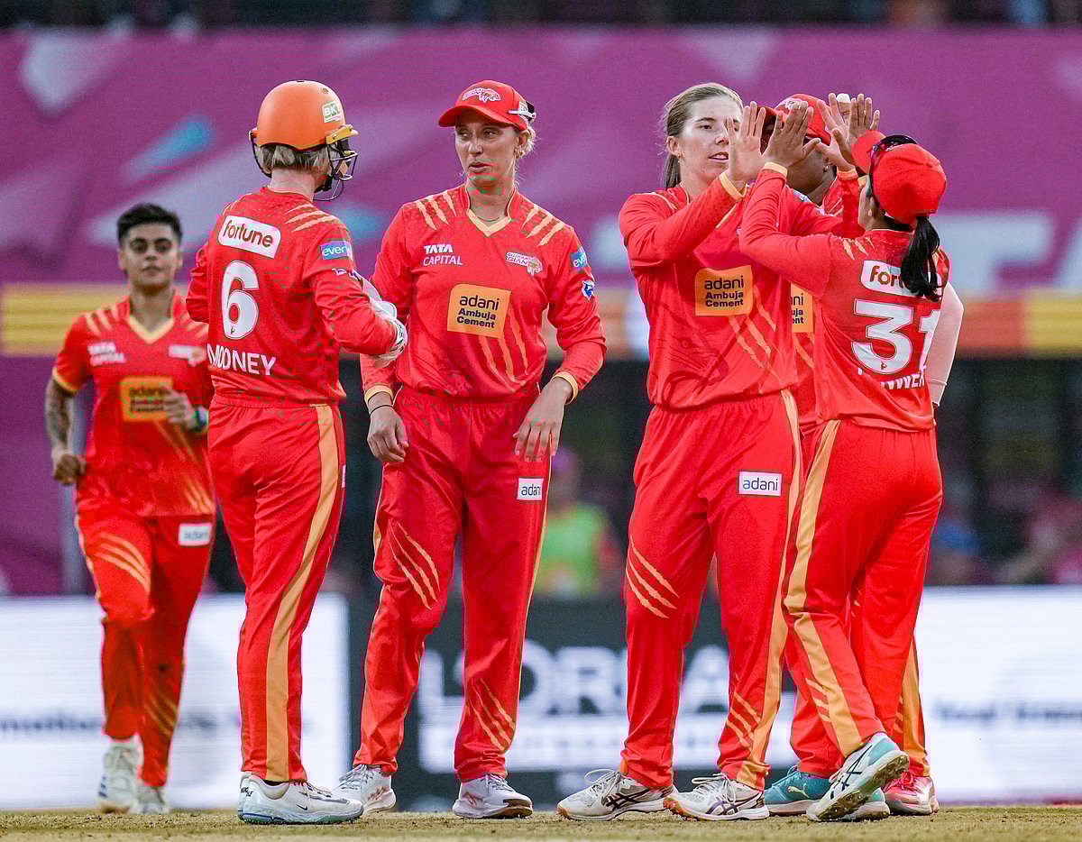 <div class="paragraphs"><p>Gujarat Giants' Georgia Wareham, front second right, celebrates with teammates after taking the wicket of UP Warriorz' captain Meg Lanning during a Women's Premier League (WPL) T20 cricket match between Gujarat Giants and UP Warriorz, at the DY Patil Stadium, in Navi Mumbai, Saturday, Jan. 10, 2026. (PTI Photo/Kunal Patil)</p></div>