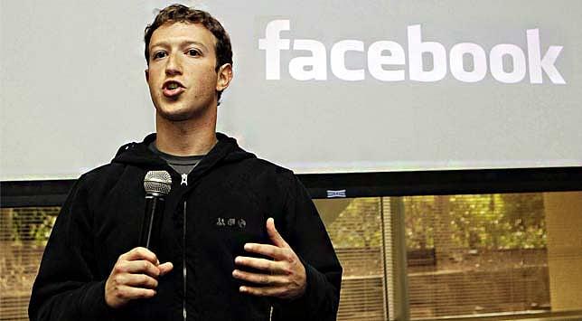 Newly-elected French President Francois Hollande (L) with outgoing Culture Minister Frederic Mitterrand