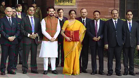 The finance minister with her team