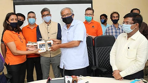  Karnataka education minister S. Suresh Kumar accepts sanitisers for students 
