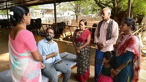 Ranjith with dairy farmers: making an impact 