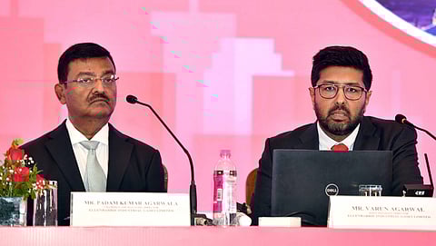 Varun and Padam Kumar at the IPO press conference in Mumbai   