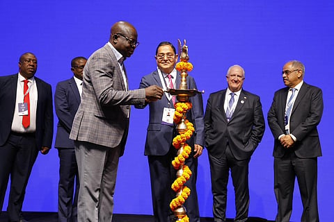 Dignitaries light the ceremonial lamp at the opening of the KP Dialogue Forum