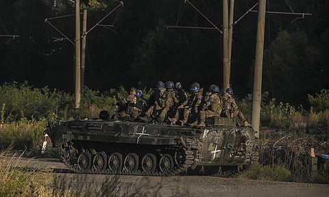 Russia says forces ‘regrouping’ as Ukraine reports gains in east