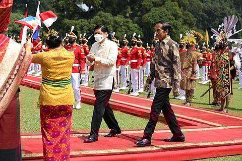 Indonesian President Joko Widodo welcomes Philippine President Bongbong Marcos during his state visit in the country on Monday. (Office of the President)