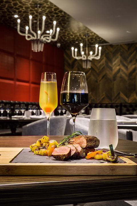 Marble+Grain serves custom-aged USDA prime beef and excellent wine selection.