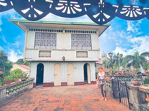 Photographs Courtesy of Jun V. Redor and Santa Rosa Studies Center
Tiongco guiding a guest in an ancestral house. Inset:  Nonia Tiongco founded the Santa Rosa Studies Center. 