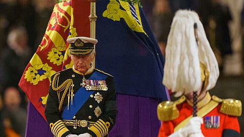 Grief and duty Britain’s King Charles III is the picture of solemnity as he attends a vigil around the coffin of Queen Elizabeth II, his mother, lying in state on the catafalque in Westminster Hall, at the Palace of Westminster in London on 16 September 2022, ahead of her funeral on Monday. The coffin is draped in the Royal Standard with the Imperial State Crown and the Sovereign’s orb and sceptre. | Dominic Lipinski / POOL/AGENCE FRANCE-PRESSE
