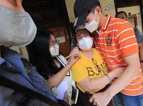 Photograph by Bob Dungo Jr. for the daily tribune @tribunephl_bob
Remedios Habin yesterday hugs her children after being acquitted of charges related to a series of bombings on 30 December 2000. Habin and Alvin Kadul were suspected to be members of the Bangsamoro Islamic Freedom Fighters.