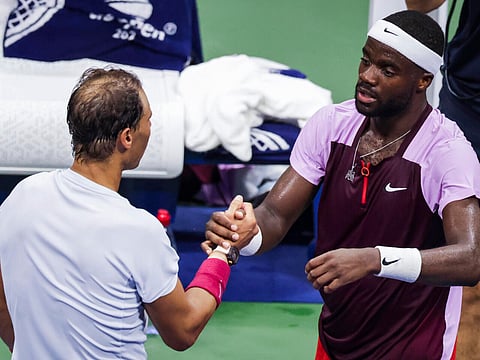 USA's Frances Tiafoe reacts after defeated Spain's Rafael Nadal during their 2022 US Open Tennis tournament men's singles Round of 16 match against at the USTA Billie Jean King National Tennis Center in New York, on September 5, 2022.