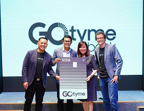 From left: GoTyme Bank co-CEO Albert Tinio, Visa country manager for the Philippines and Guam Jeff Navarro, BancNet CEO Emmie Reyes, and GoTyme Bank president and CEO Nathaniel Clarke seal partnership to promote better financial inclusion in the Philippines through the free GoTyme Bank ATM debit card and convenient services. | Photograph courtesy of GoTyme Bank