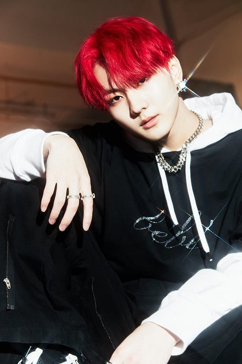 Enhyphen’s Jungwon sporting red locks. | Photograph courtesy of hybe