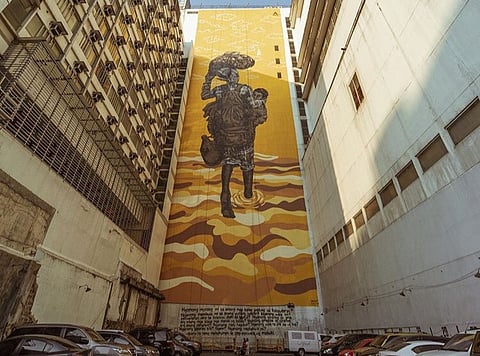 PHOTOGRAPH courtesy of Benilde Center for Campus Art
‘Bakwit’ by Filipino street artist and painter Archie Oclos .
