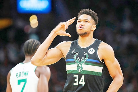 BOSTON, MASSACHUSETTS - MAY 15: Giannis Antetokounmpo #34 of the Milwaukee Bucks reacts after a three point basket during the first quarter against the Boston Celtics in Game Seven of the 2022 NBA Playoffs Eastern Conference Semifinals at TD Garden on May 15, 2022 in Boston, Massachusetts. NOTE TO USER: User expressly acknowledges and agrees that, by downloading and/or using this photograph, User is consenting to the terms and conditions of the Getty Images License Agreement.   Adam Glanzman/Getty Images/AFP (Photo by Adam Glanzman / GETTY IMAGES NORTH AMERICA / Getty Images via AFP)