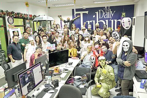 THE Addams family... not. The Daily Tribune team flexing their Halloween OOTD. | PHOTOGRAPHS BY JHAY R DIEGO FOR THE DAILY TRIBUNE