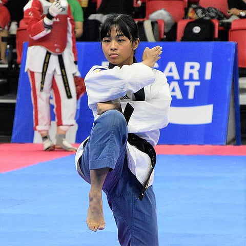 JOCELYN Ninobla asserts her dominance by winning a pair of gold medals in the poomsae events of the 8th PSC-Women’s Martial Arts Festival. | PHOTOGRAPH COURTESY OF PSC
