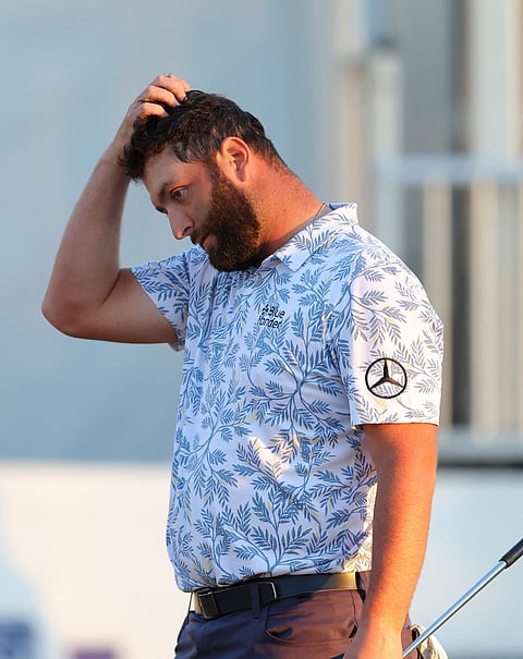 RIDGELAND, SOUTH CAROLINA - OCTOBER 22: Jon Rahm of Spain reacts to a missed birdie putt on the 18th green during the third round of the CJ Cup at Congaree Golf Club on October 22, 2022 in Ridgeland, South Carolina.   Kevin C. Cox/Getty Images/AFP (Photo by Kevin C. Cox / GETTY IMAGES NORTH AMERICA / Getty Images via AFP)