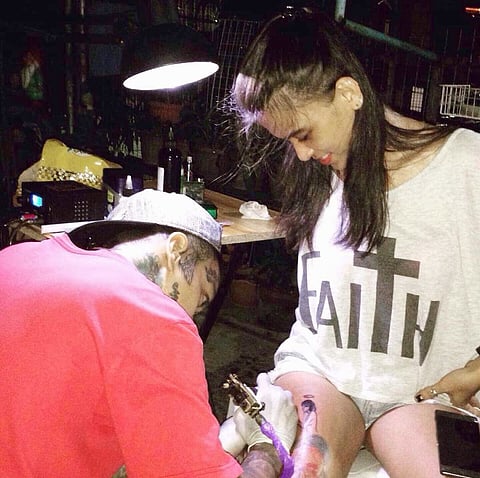 TRIBUNE reporter Cherk Balagtas gets inked.