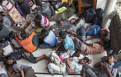Ethnic Rohingya refugees rest at a temporary shelter in North Aceh, Indonesia, Tuesday, Nov. 15, 2022. More than 100 Rohingya Muslims traveling in a boat were found along the coast of Indonesia’s Aceh province on Tuesday. (AP Photo/Zik Maulana)
