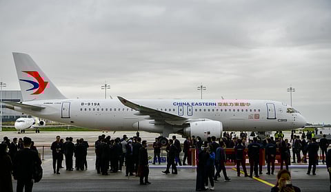 BEIJING’S first domestically produced large passenger jet, the CACC C919, is handed over to China Eastern Airlines in Shanghai on 9 December 2022. | STR/Agence france-presse