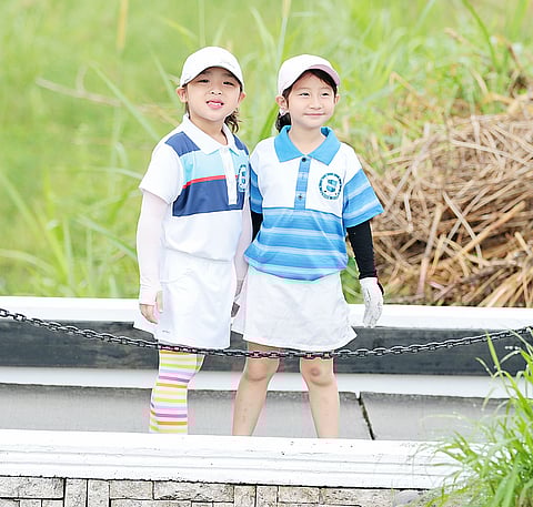 Photograph by Joey Sanchez Mendoza 
for the Daily Tribune @tribunephl_joey
IMMACULATE Conception Academy teammates Athena Winter Serapio (left) and Stephanie Gan shine during the final leg of the 2022 Interschools golf team tournament organized by the Junior Golf Foundation of the Philippines at the Mimosa Plus Golf Club in Clark, Angeles.