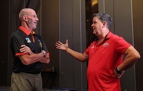 Barangay Ginebra’s Tim Cone and Bay Area’s Brian Goorjian exchange pleasantries two days before they tangle in Game 1 of the PBA Commissioner’s Cup best-of-seven finals. | Photograph by Rio deluvio for the daily tribune @tribunephl_rio