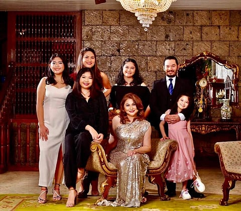The Torres-Ackerman family: (from left, clockwise) Bea, Mica, Cielo, David, Emilia, Mache, and Daniela.