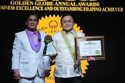 SENATOR Christopher ‘Bong’ Go holds aloft the Golden Globe trophy and plaque he received from the Golden Globe Awards. | Photograph COURTESY OF SBG