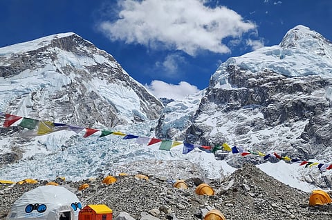 Tents of mountaineers are pictured at the Everest base camp in the Mount Everest region of Solukhumbu district, on 12 April 2023. - A search was underway for three Nepali climbers who fell into a crevasse while ascending Everest on 12 April the first such accident on the world's highest mountain this climbing season. 