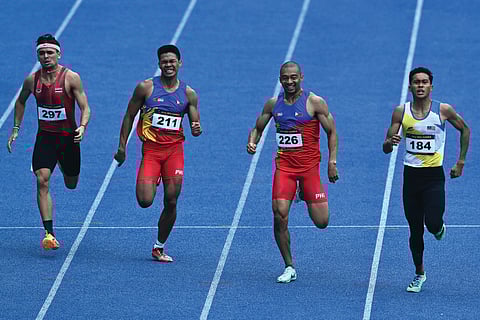 MOHD RASFAN/AGENCE FRANCE-PRESSE
MALAYSIAN Umar Osman (right) finishes ahead of Filipinos Umajesty Williams (second from right) and Frederick Ramirez Cabatu (second from left) and Thai Joshua Robert Atkinson (left) in the men’s 400m final during the 32nd Southeast Asian Games in Phnom Penh on 9 May.
